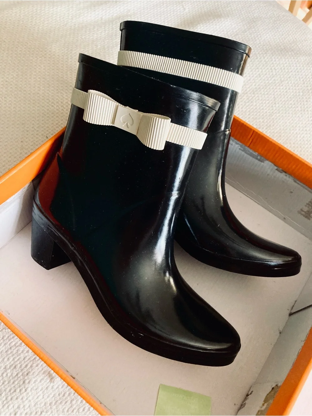 kate spade Black Gloss Ankle Rain Boots with Cream Bow Trim
